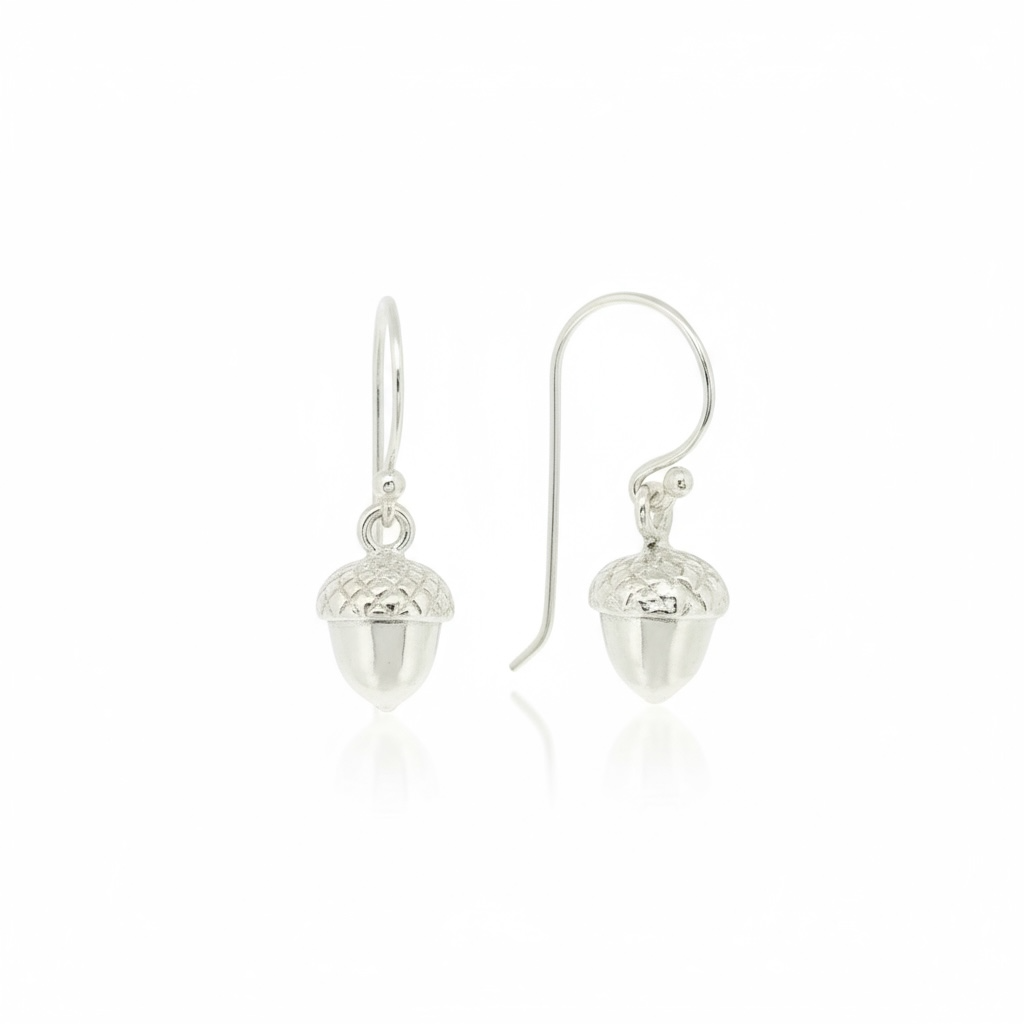 Sterling Silver acorn-shaped hook earrings on a white background from The Herbarium Collection at Twelve Silver Trees Jewellery and Gifts