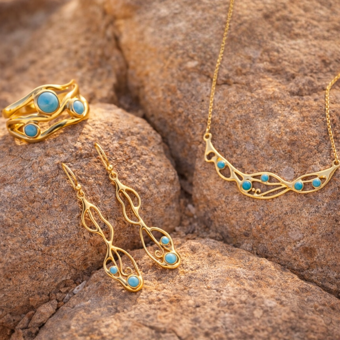 Terra Sol Gold vermeil turquoise drop earrings, ring and necklace with organic flowing design photographed on natural stone – The sunlit Earth collection by Twelve Silver Trees Jewellery