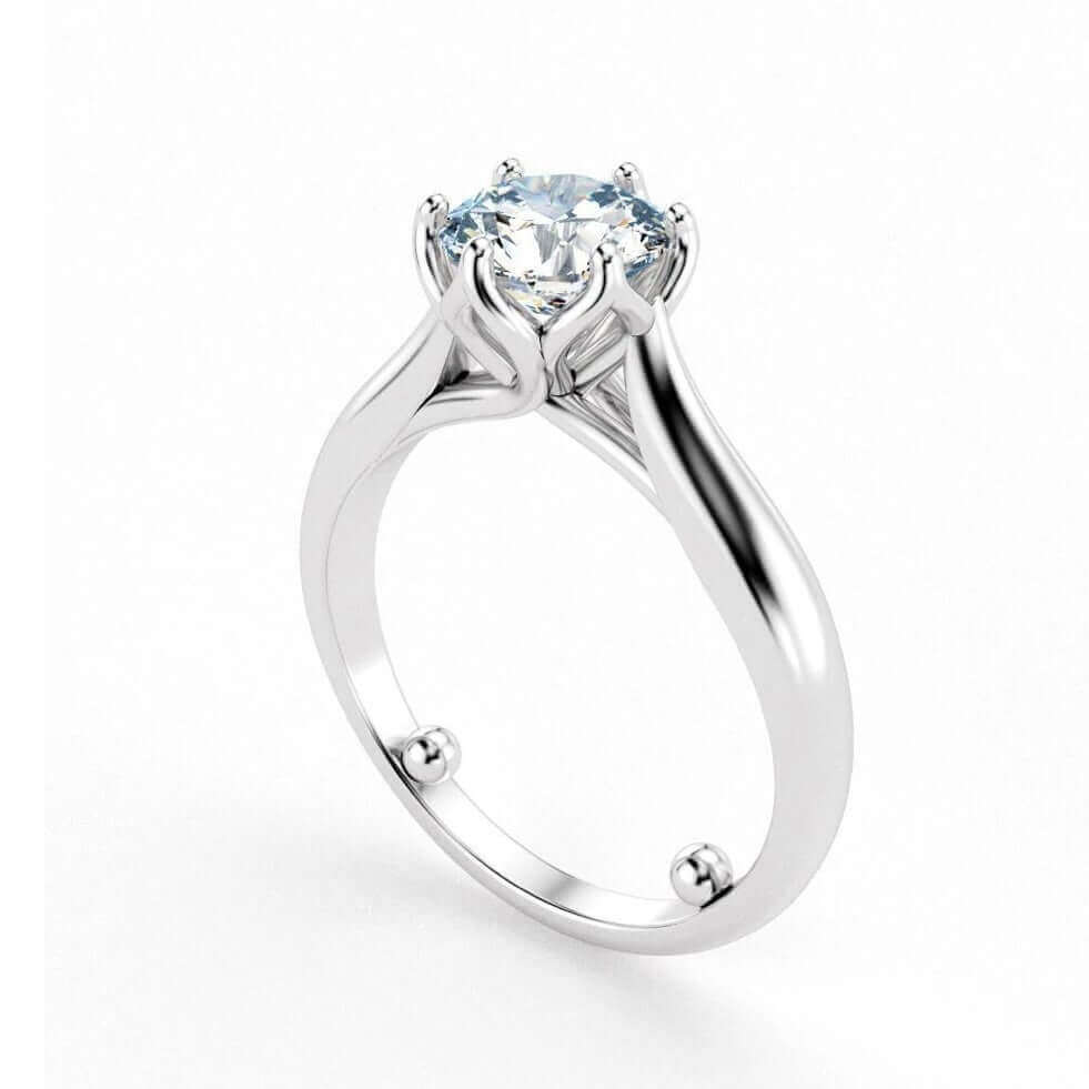 5 Alternatives To Permanently Resizing Your Treasured Rings. Blog post cover image of a diamond solitaire ring 