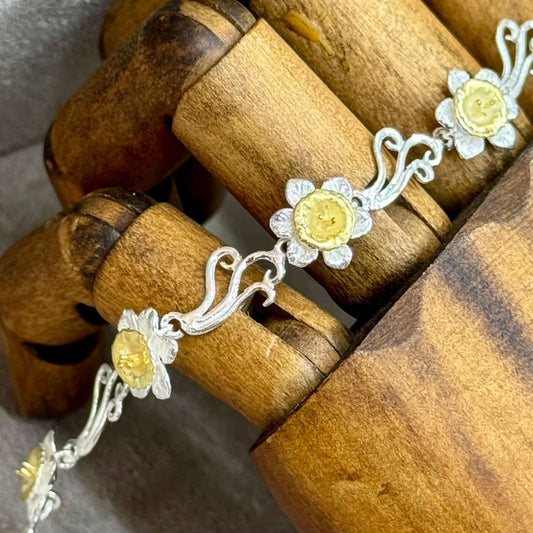 Handmade Sterling Silver Daffodil Flower Link Bracelet with 18 Carat Gold Accents | The Daffodil Collection | Twelve Silver Trees Jewellery & Gifts