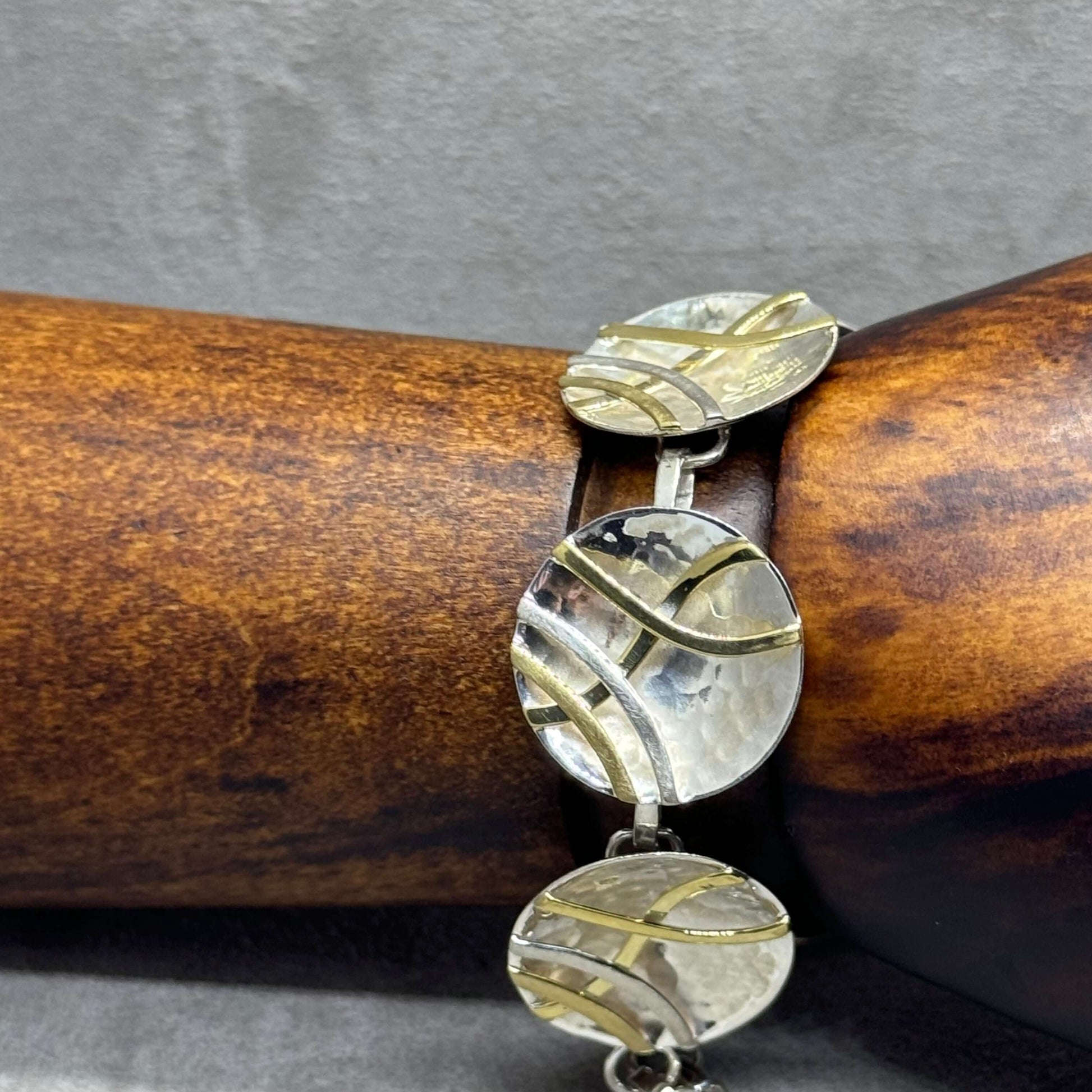 Hammered Sterling Silver Concave Disc Bracelet with Linear Brass Details - Twelve Silver Trees