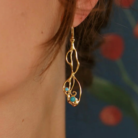 The Terra Sol Turquoise and gold vermeil statement drop earrings inspired by natural flowing forms from the sunlit earth collection at Twelve Silver Trees Jewellery 