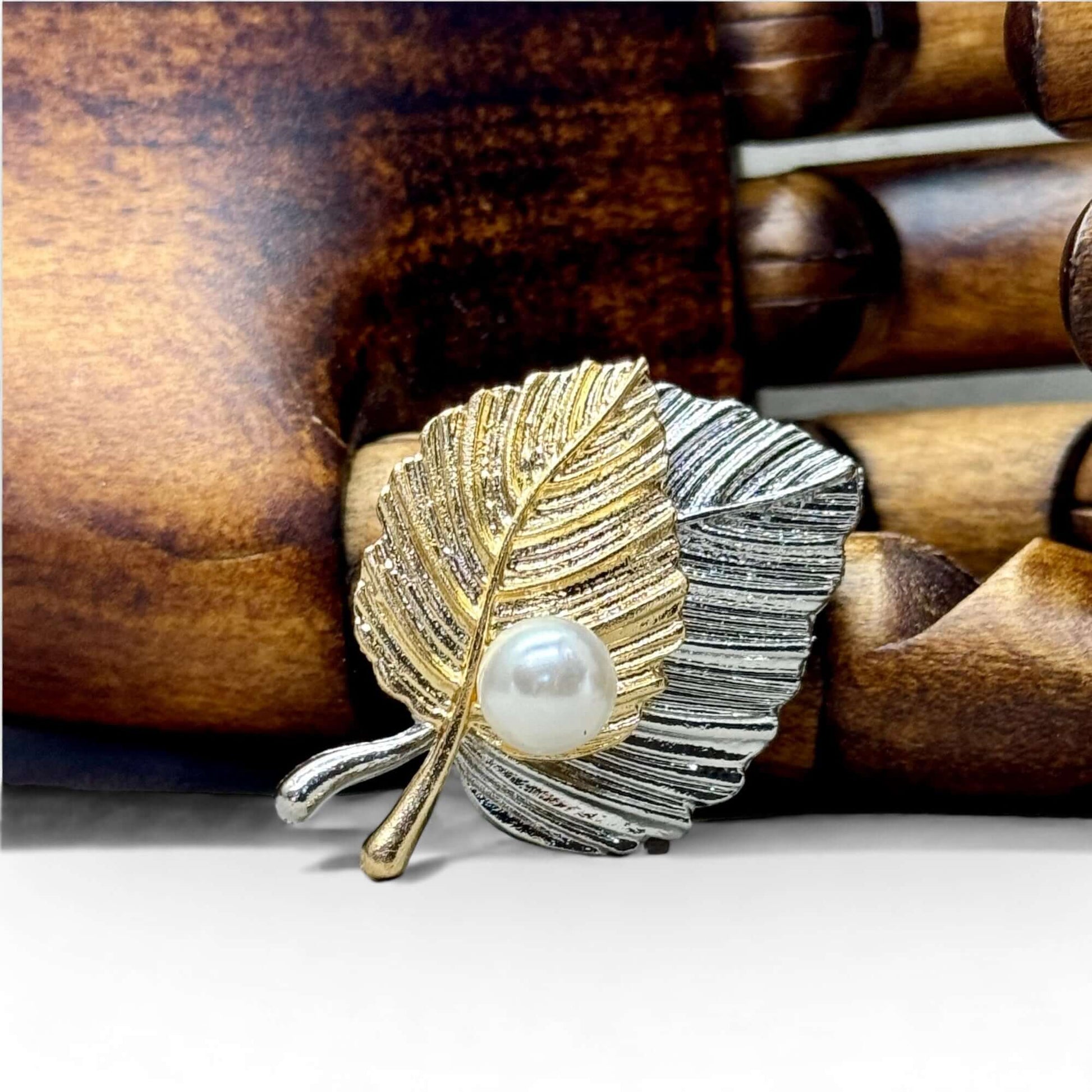 Elegant Dual-Tone Leaf Brooch with Simulated Pearl Accent - Twelve Silver Trees