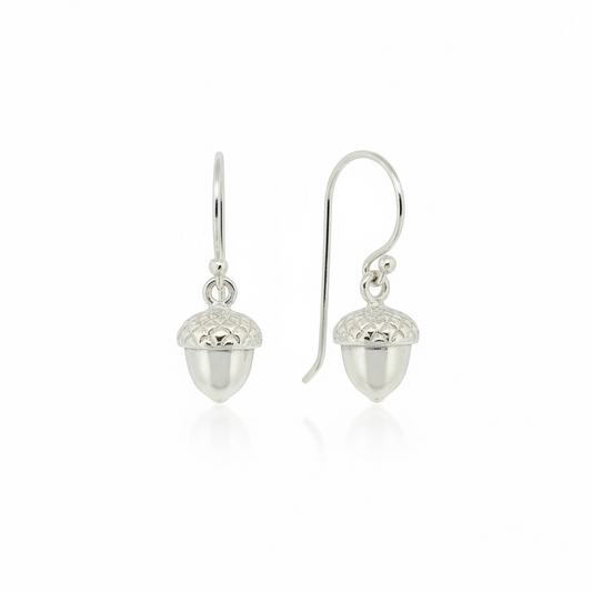 Sterling Silver acorn-shaped hook earrings on a white background from The Herbarium Collection at Twelve Silver Trees Jewellery and Gifts 