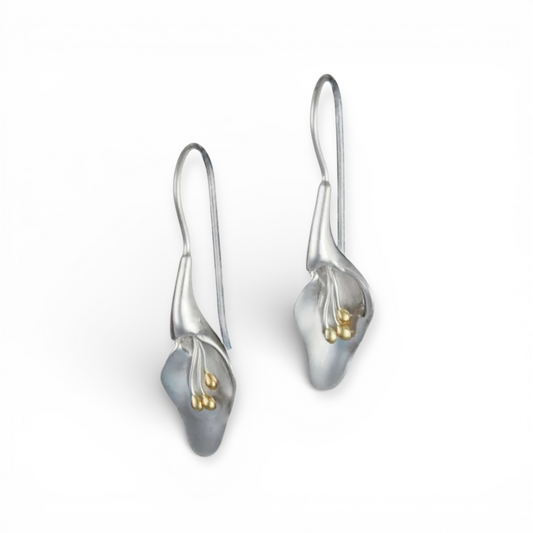 Silver calla lily earrings with gold accents on a white background from the herbarium collection at Twelve Silver Trees Jewellery 