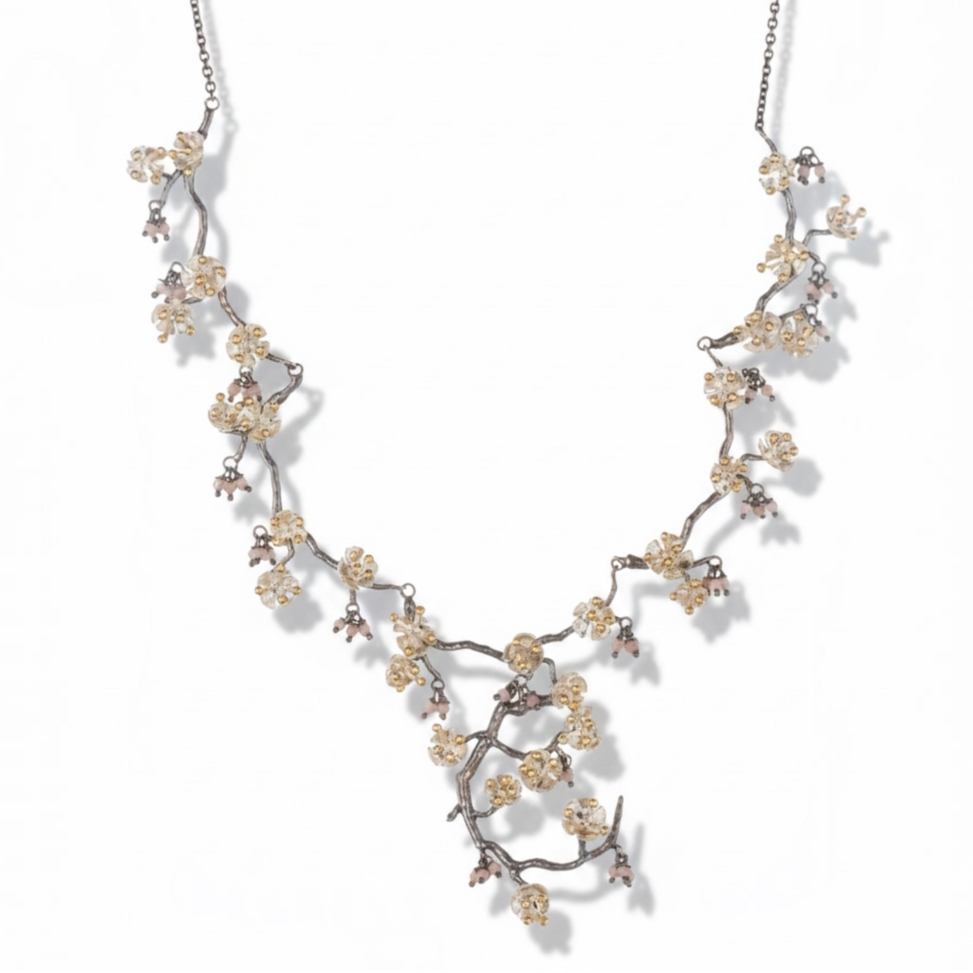 Almond Blossom statement necklace inspired by flowering branches with pink gemstone accents