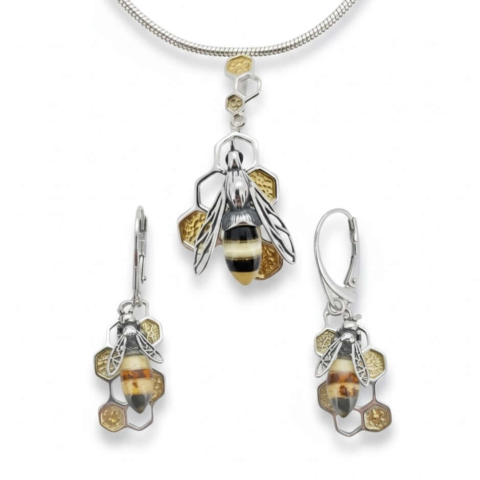 Baltic amber bee pendant and matching honeycomb earrings in sterling silver from the bee collection at twelve silver trees jewellery 