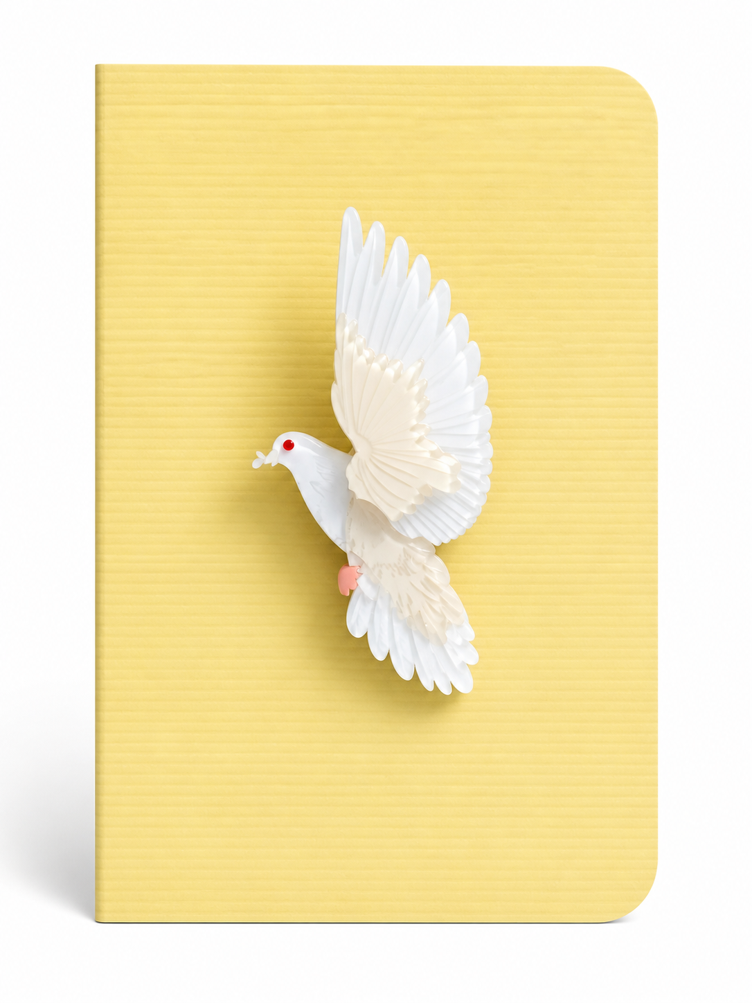 Elegant dove keepsake card featuring a white flying dove brooch mounted on a textured greeting card, symbolising peace and hope.
