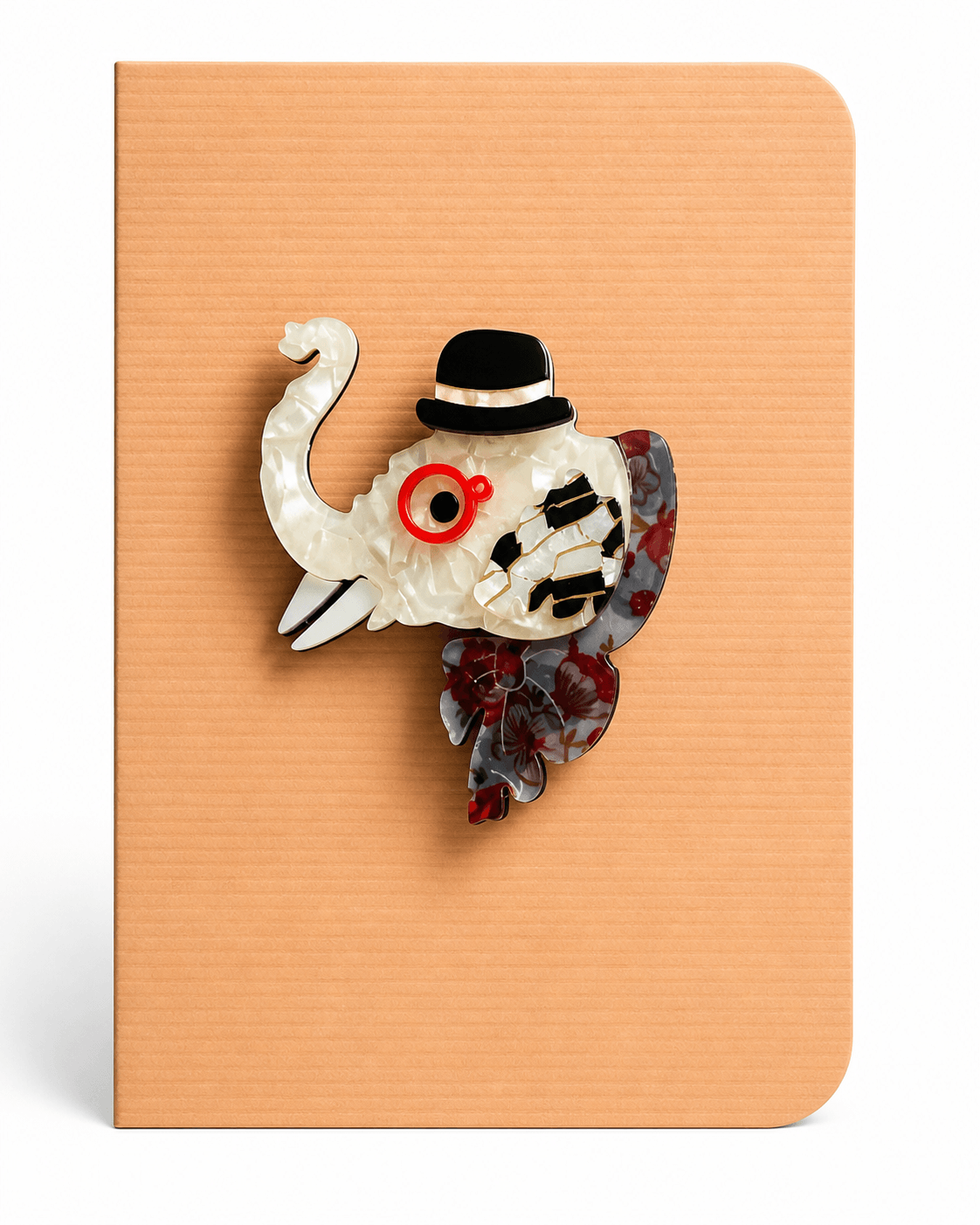 Charming elephant keepsake card featuring a decorative elephant brooch mounted on a textured greeting card, a thoughtful card and keepsake gift in one.