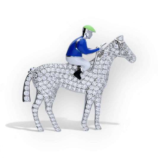 Horse and jockey sterling silver enamel brooch with pavé zirconia stones on a clean white background