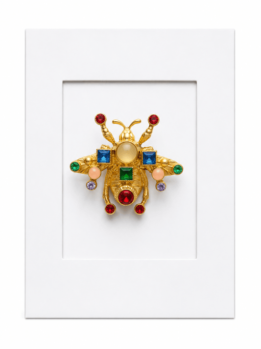 Keepsake brooch card featuring a colourful jewel bee brooch with multicoloured gemstones on a white display card