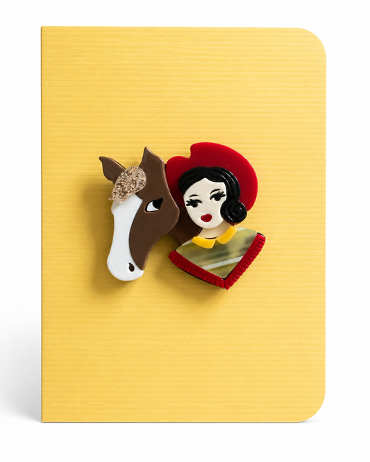 Elegant lady and horse keepsake card featuring a beautifully detailed brooch design mounted on a textured greeting card, perfect as a keepsake gift.