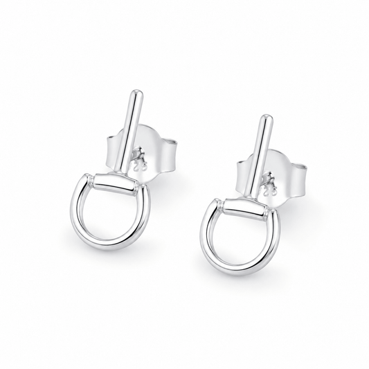 Mini sterling silver snaffle stud earrings with polished equestrian-inspired design on a white background