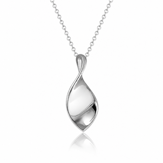 Organic leaf sterling silver pendant necklace with polished flowing leaf design on a fine silver chain against a white background
