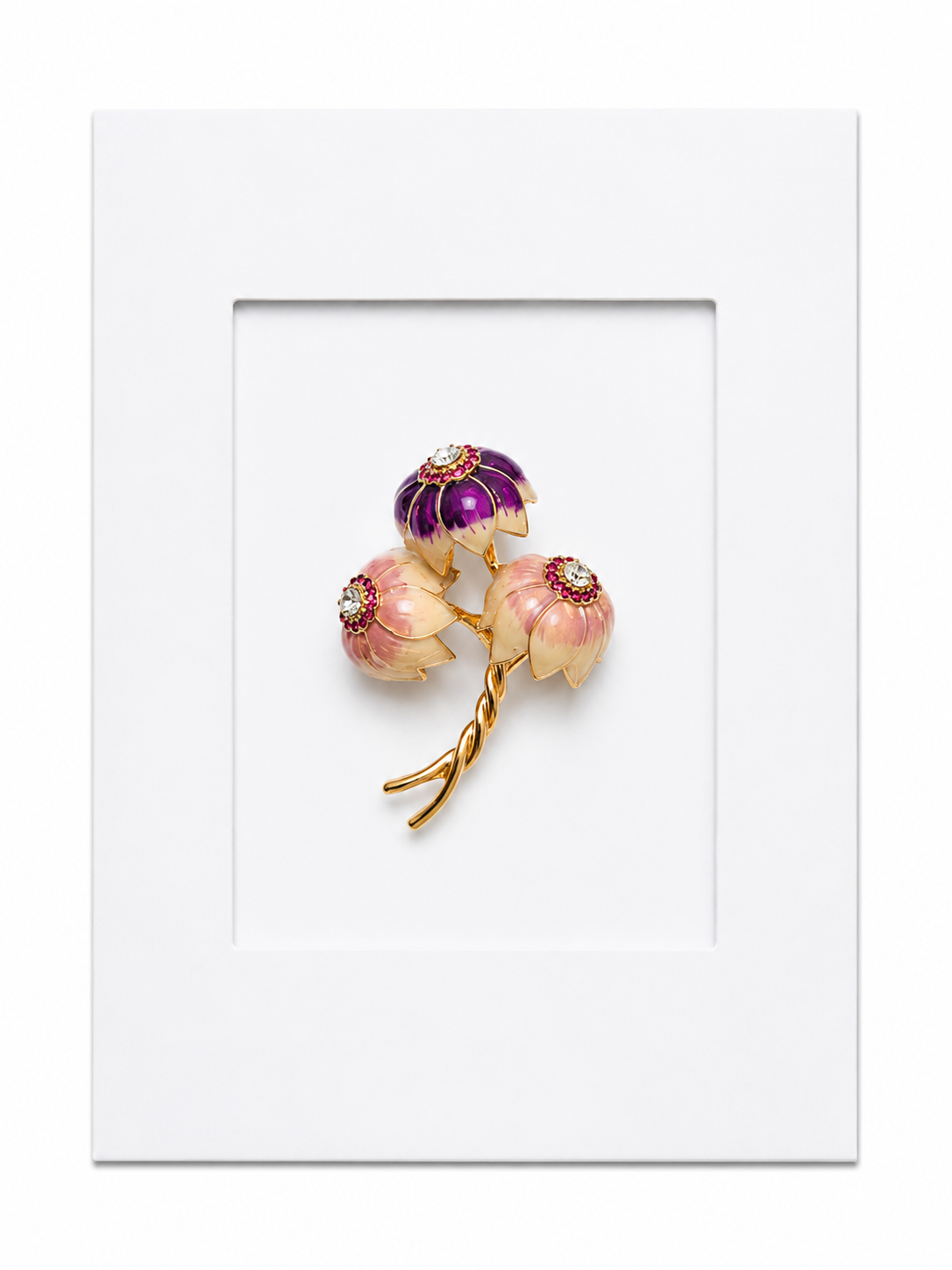 Keepsake brooch card featuring a delicate purple floral brooch with gold stem detailing on a white display card