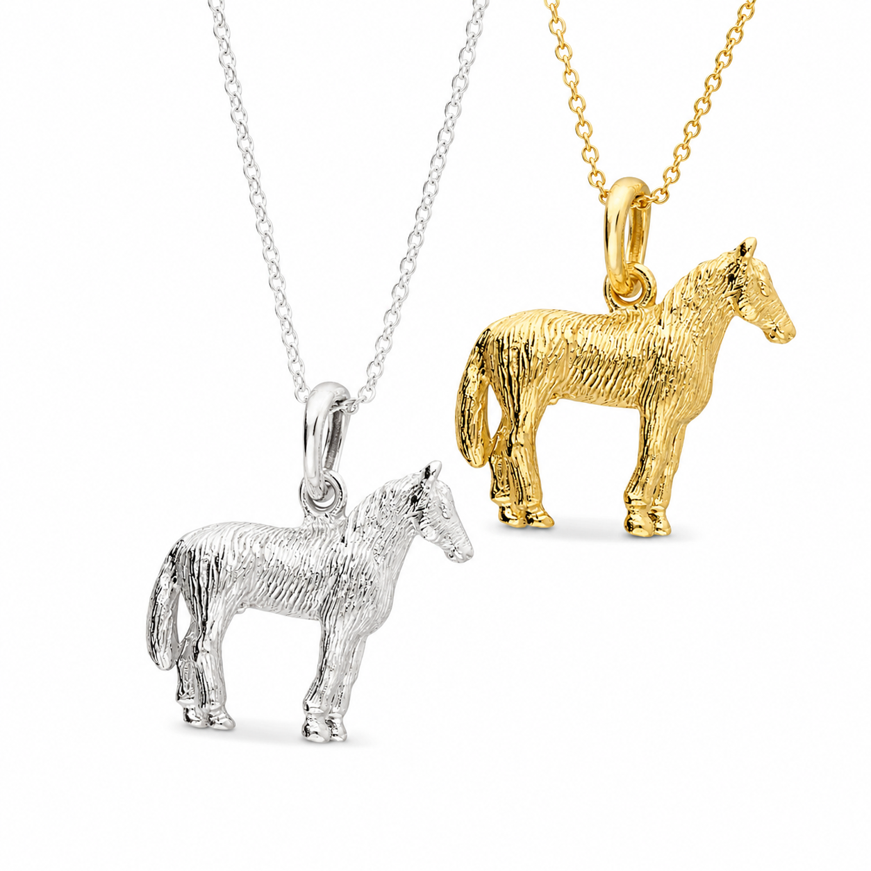 Sterling silver and 18ct gold vermeil horse pendant necklaces on matching chains against a white background