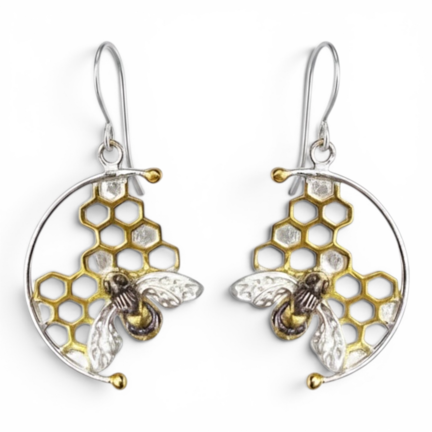 Handmade sterling silver honeycomb bee hook earrings with 22ct gold vermeil honeycomb details on a white background.