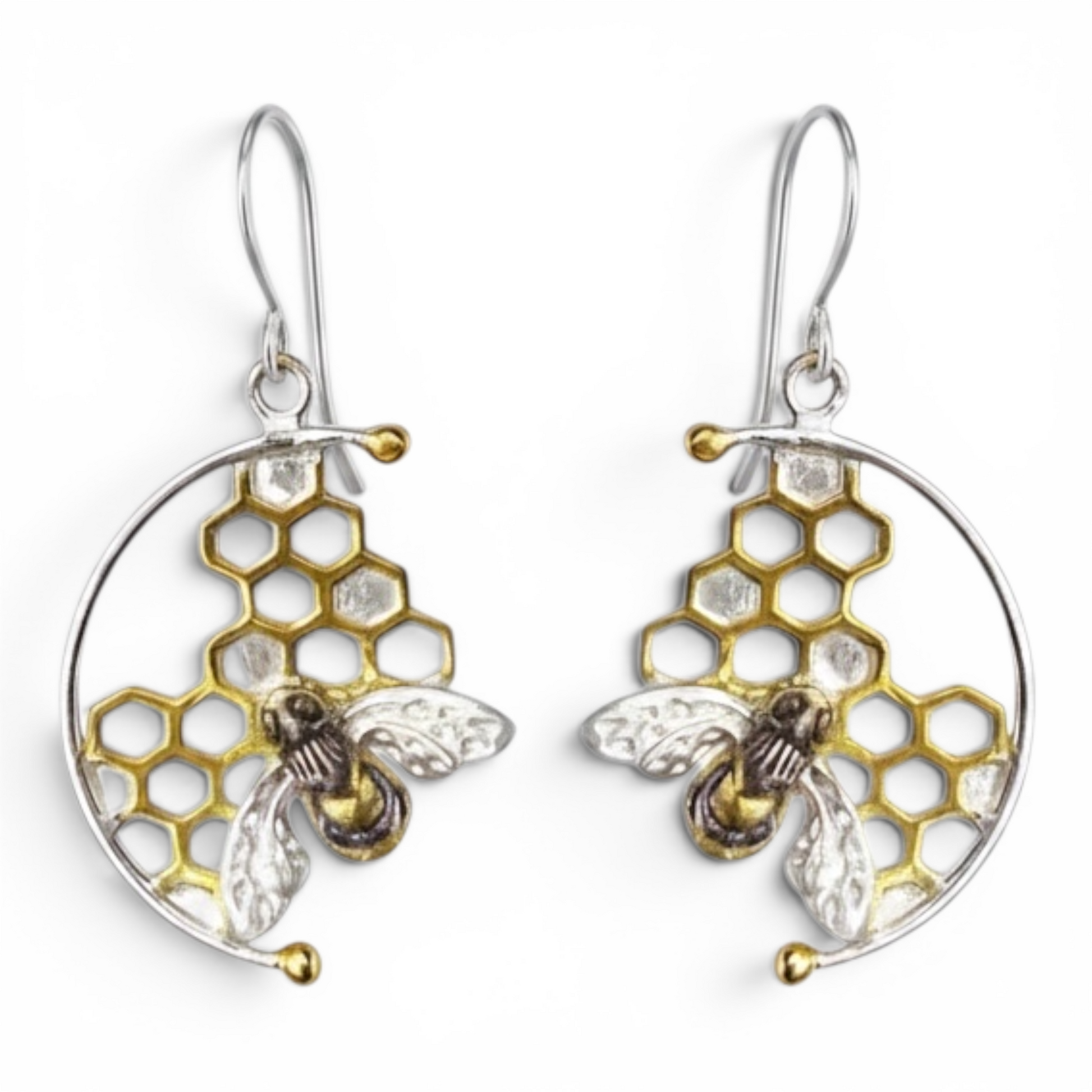 Handmade sterling silver honeycomb bee hook earrings with 22ct gold vermeil honeycomb details on a white background.