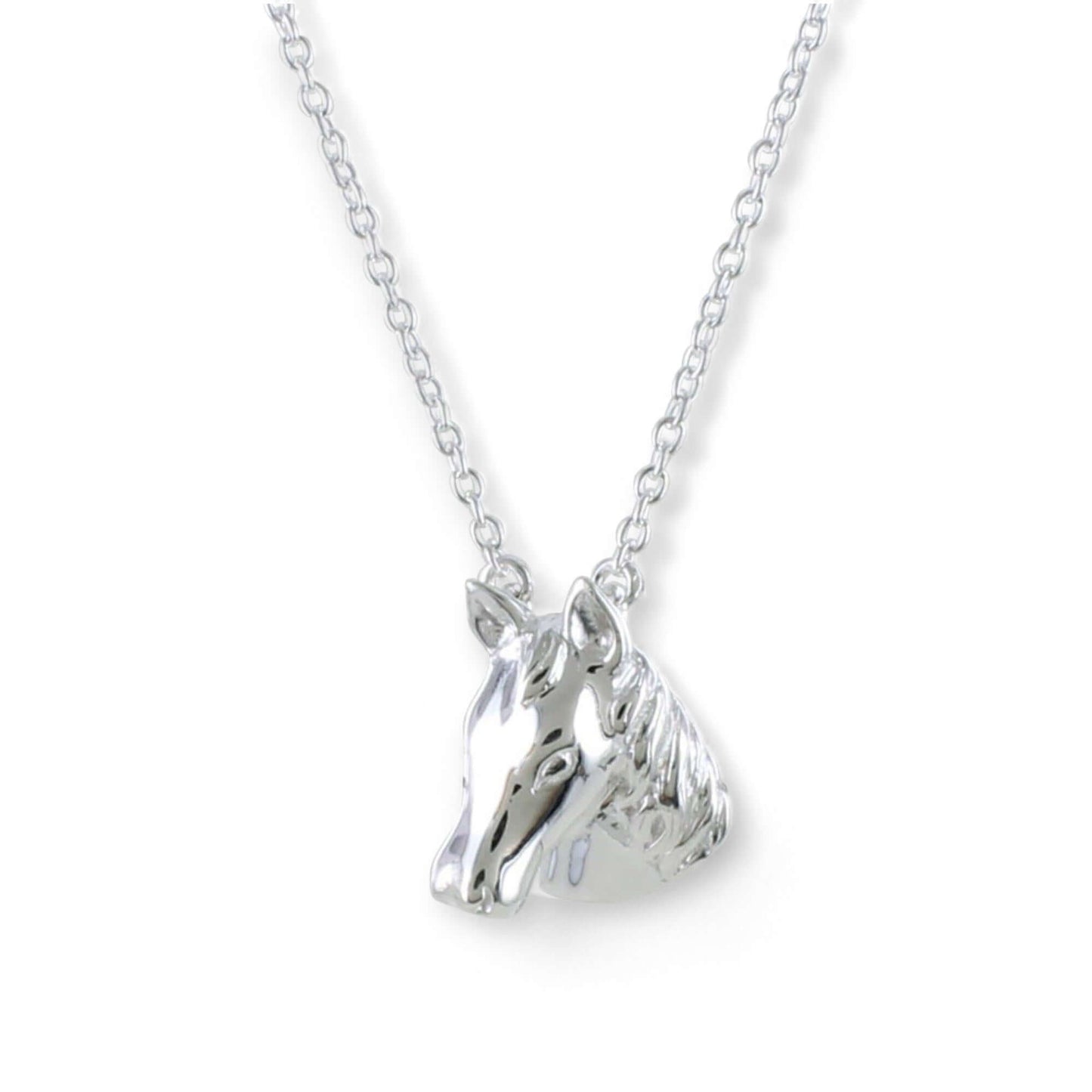 Sterling silver horse head necklace with polished finish on a white background