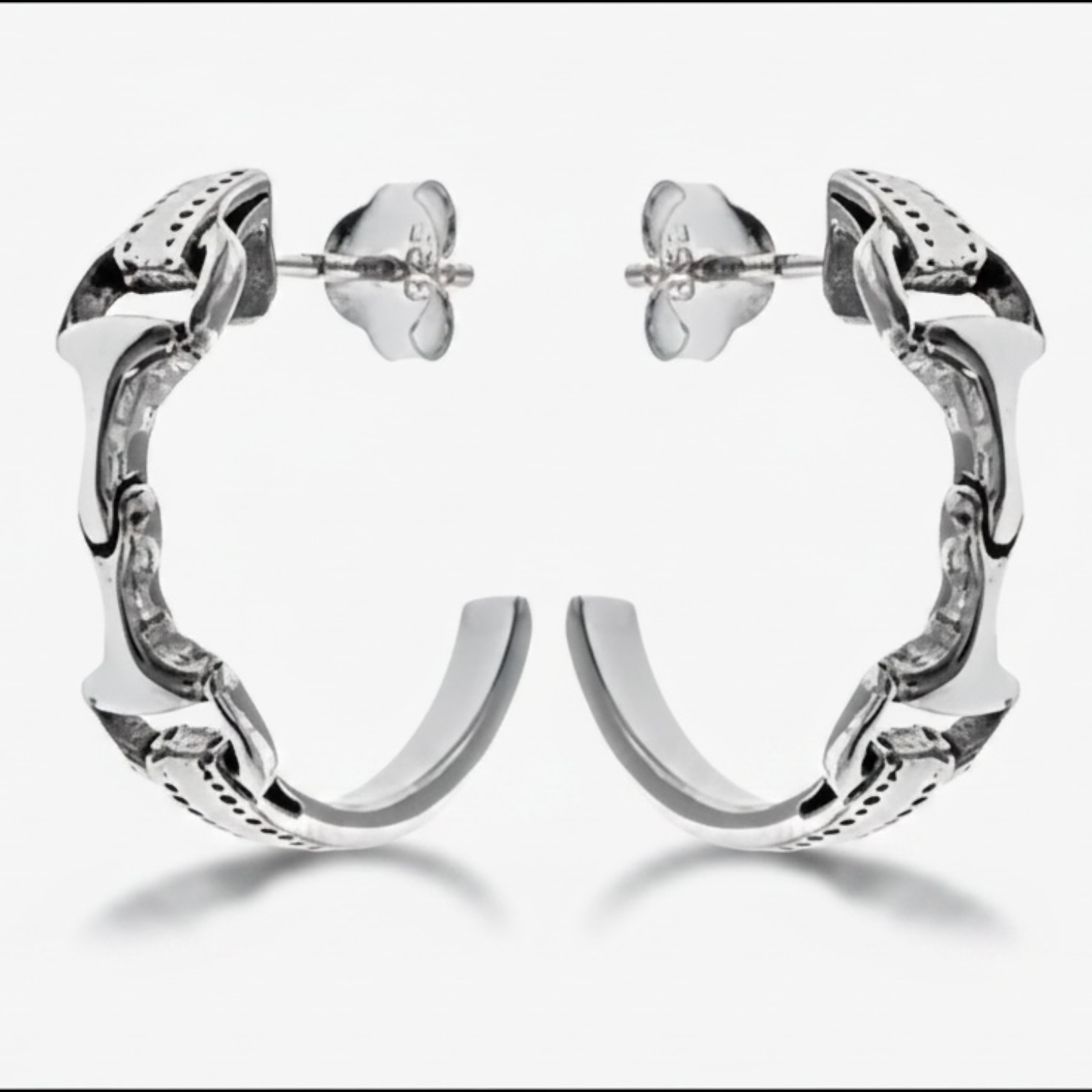 Sterling silver snaffle half hoop earrings with equestrian bit detail and stud fastening
