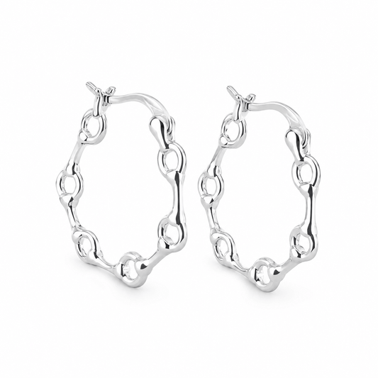 Sterling silver snaffle hoop earrings with polished equestrian-inspired link design on a white background