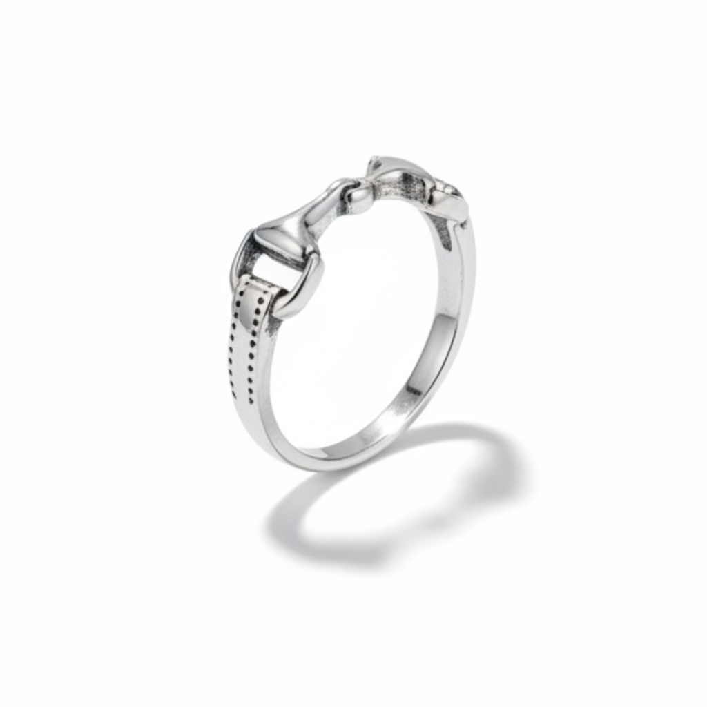 Side profile view of a sterling silver snaffle ring featuring a horse bit design.