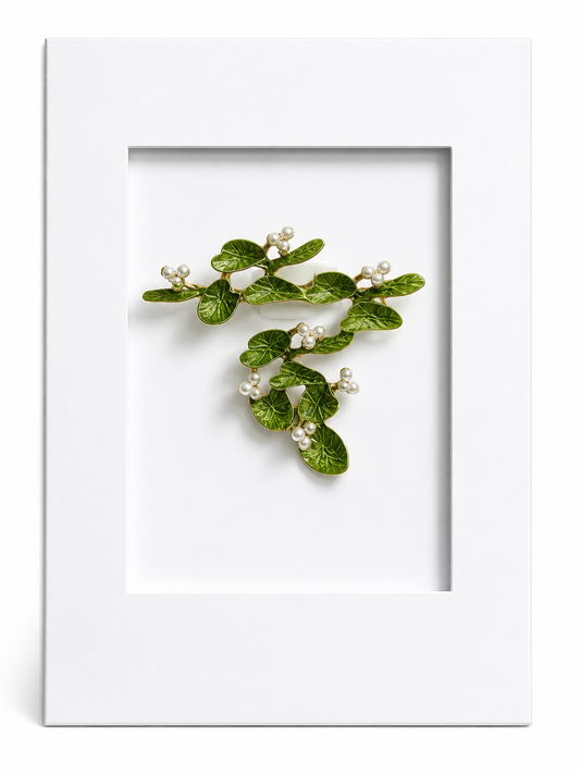 Elegant Water Lily Keepsake Card featuring a botanical enamel brooch inspired by floating lily pads, finished with delicate faux pearl detailing and mounted on a textured greeting card.