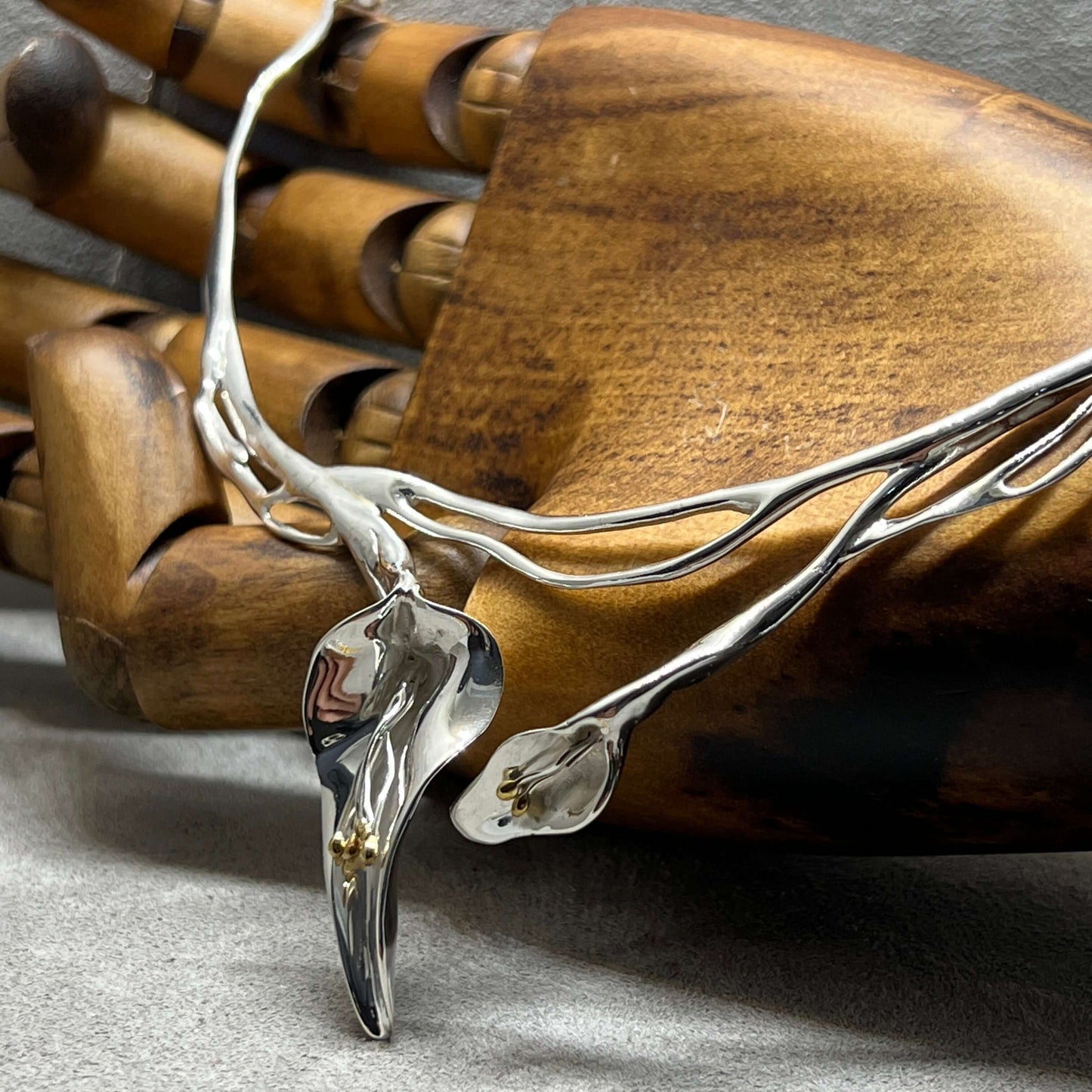 Elegant sculptural Calla Lily necklace in sterling silver and gold accents - Twelve Silver Trees