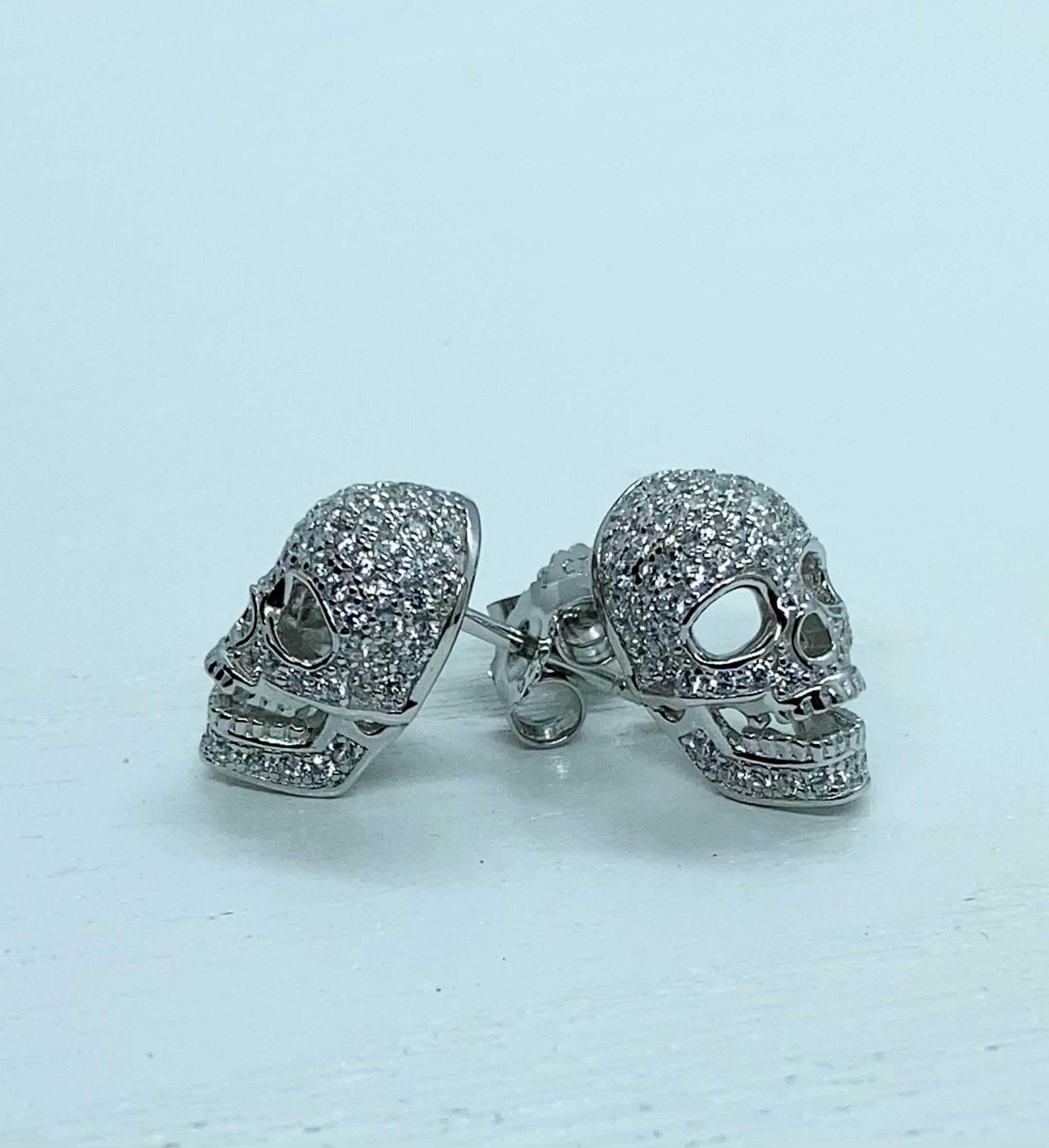 Silver skull hot sale stud earrings